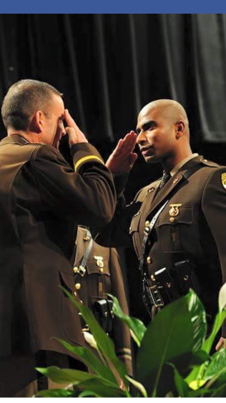 Jhohan Ganeshananda in uniform at a Maryland State Police ceremony